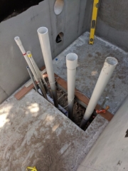 Here are all the pipes that are going to be coming up through the hole.