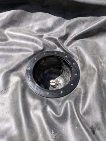 Here's one of the bottom drains attached to the liner.